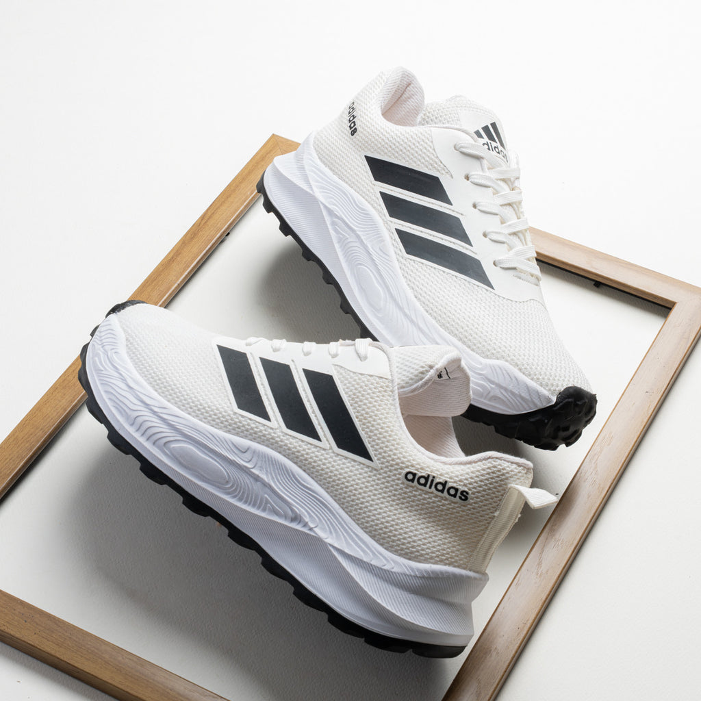 كوتشي adidas ايڤا K17 ( مخزن 16 )